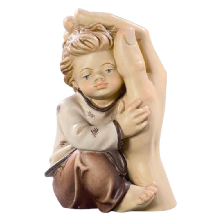 1162-schuetzende-hand-bub
