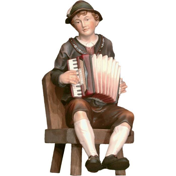 Ziehharmonikaspieler auf Stuhl- holz geschnitzt