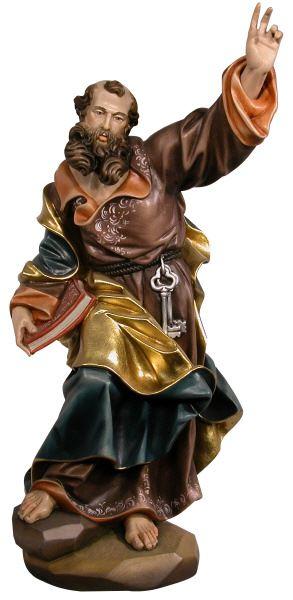 Eine bemalte religiöse Figur eines bärtigen Heiligen in brauner und goldener Gewandung mit erhobener Hand.
